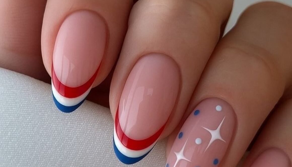 oval manicured nails with red white and blue french tips and star accent art
