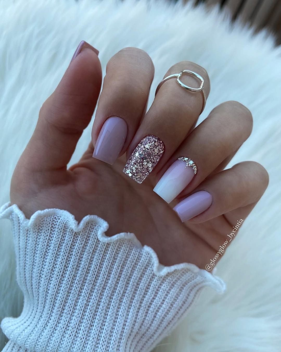square light purple manicured nails with a pink glitter and rhinestone accent nail