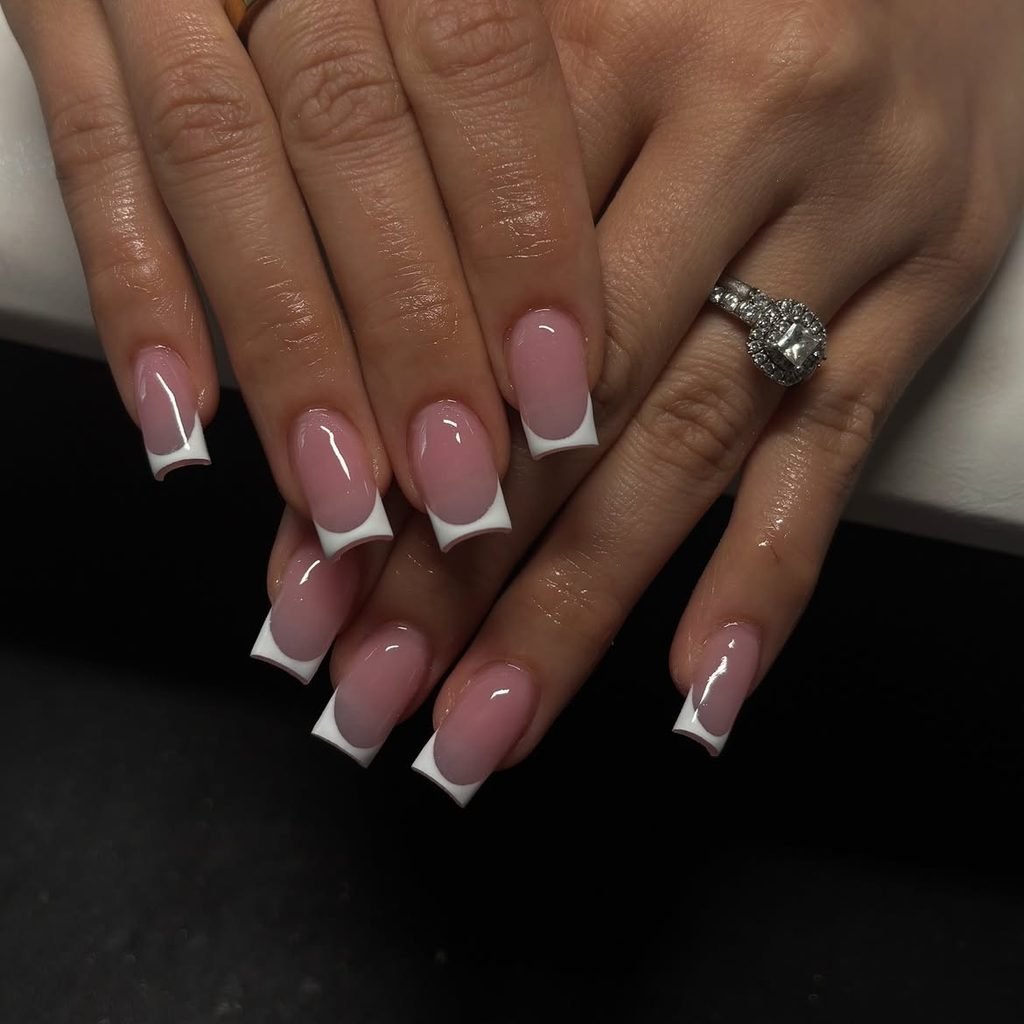 square shaped gel nails with a clean classic white french manicure design