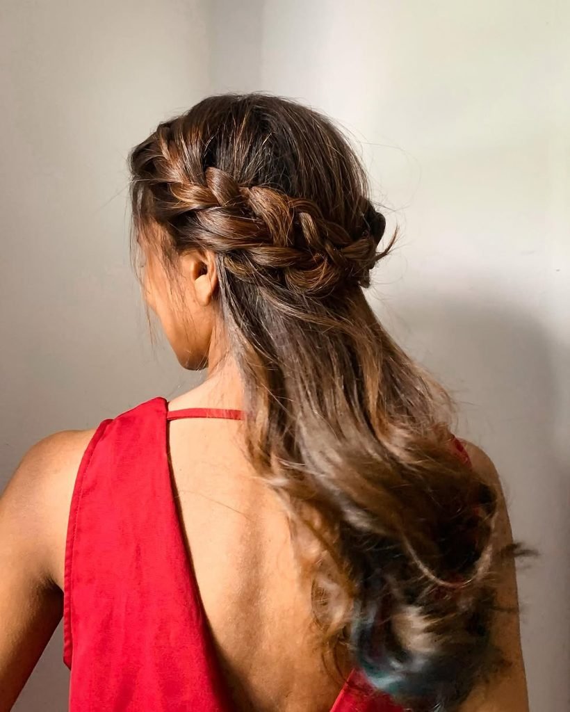 back view of a half up braided crown summer hairstyle on long hair