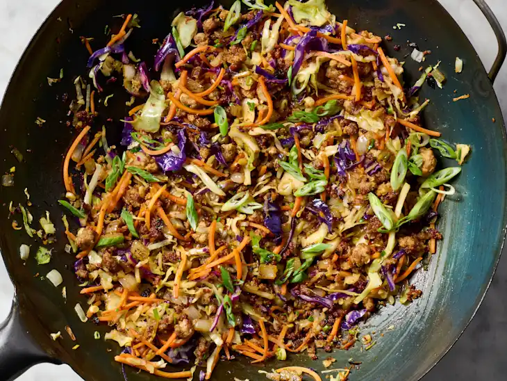 egg roll in a bowl stir fry with shredded cabbage and carrots