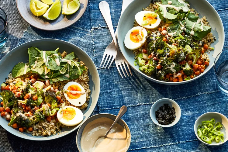 roasted vegetable quinoa bowls with soft-boiled eggs, broccoli, and greens