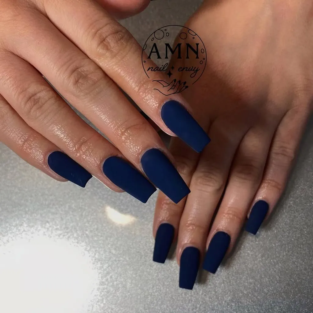 long square matte navy blue nails on intersecting hands